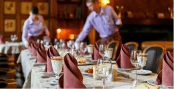 waiters serve table